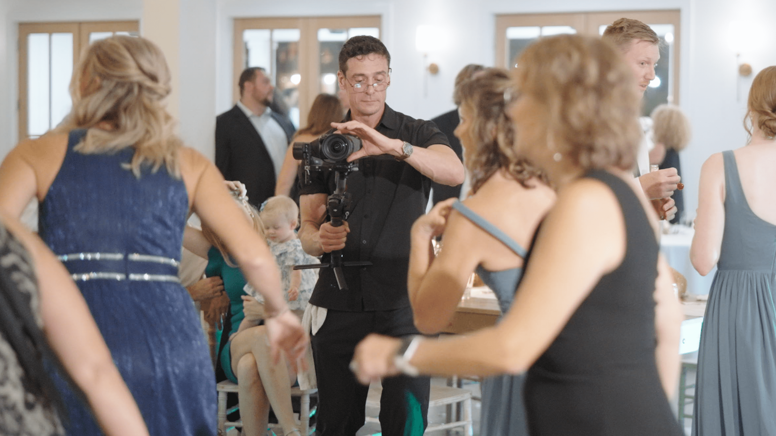 Wedding Videographer captures dancing at reception